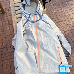 Columbia Light Tan Jacket with Bright Orange Zipper